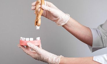 После удаления болит соседний зуб